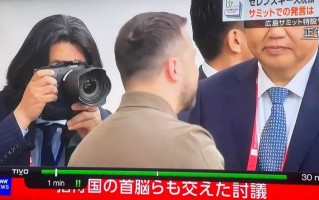 佳能神秘新机现身G7峰会 或为新旗舰EOS R1